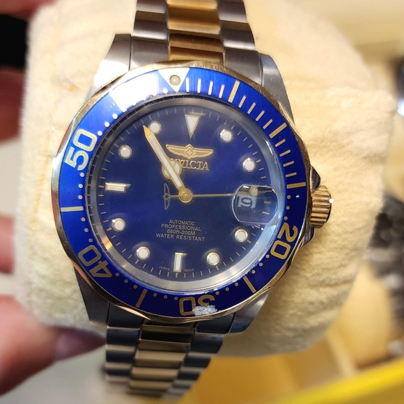 invicta men's pro diver 200m nh35a date
